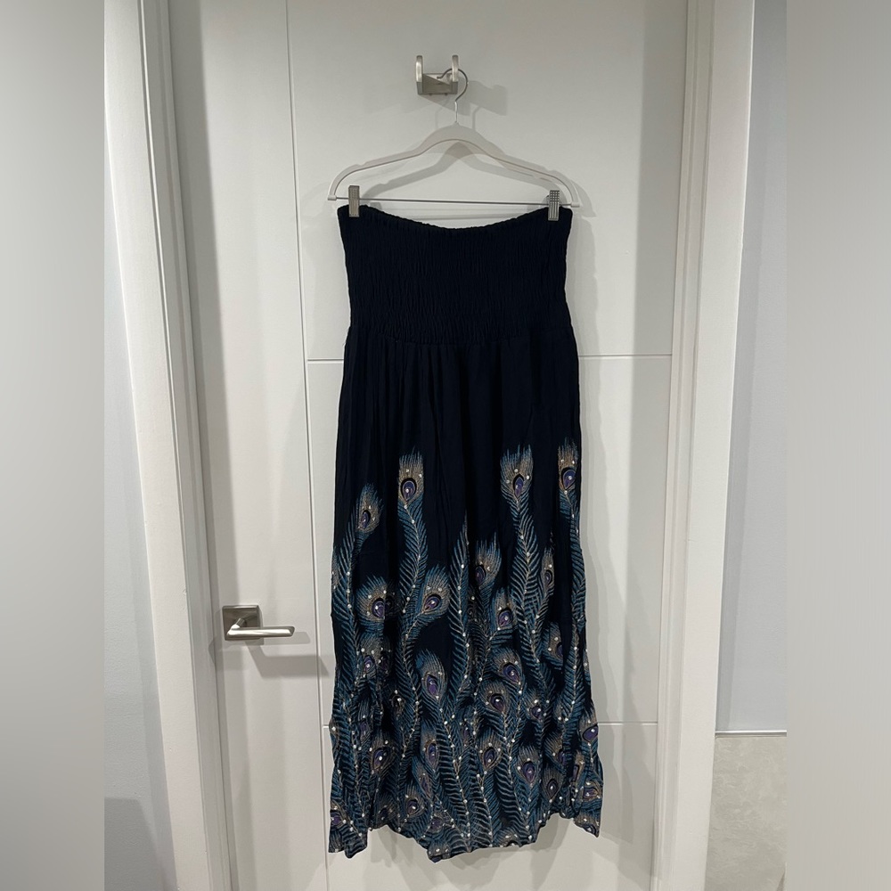 Cassee’s strapless peacock dress, 3X, used once.